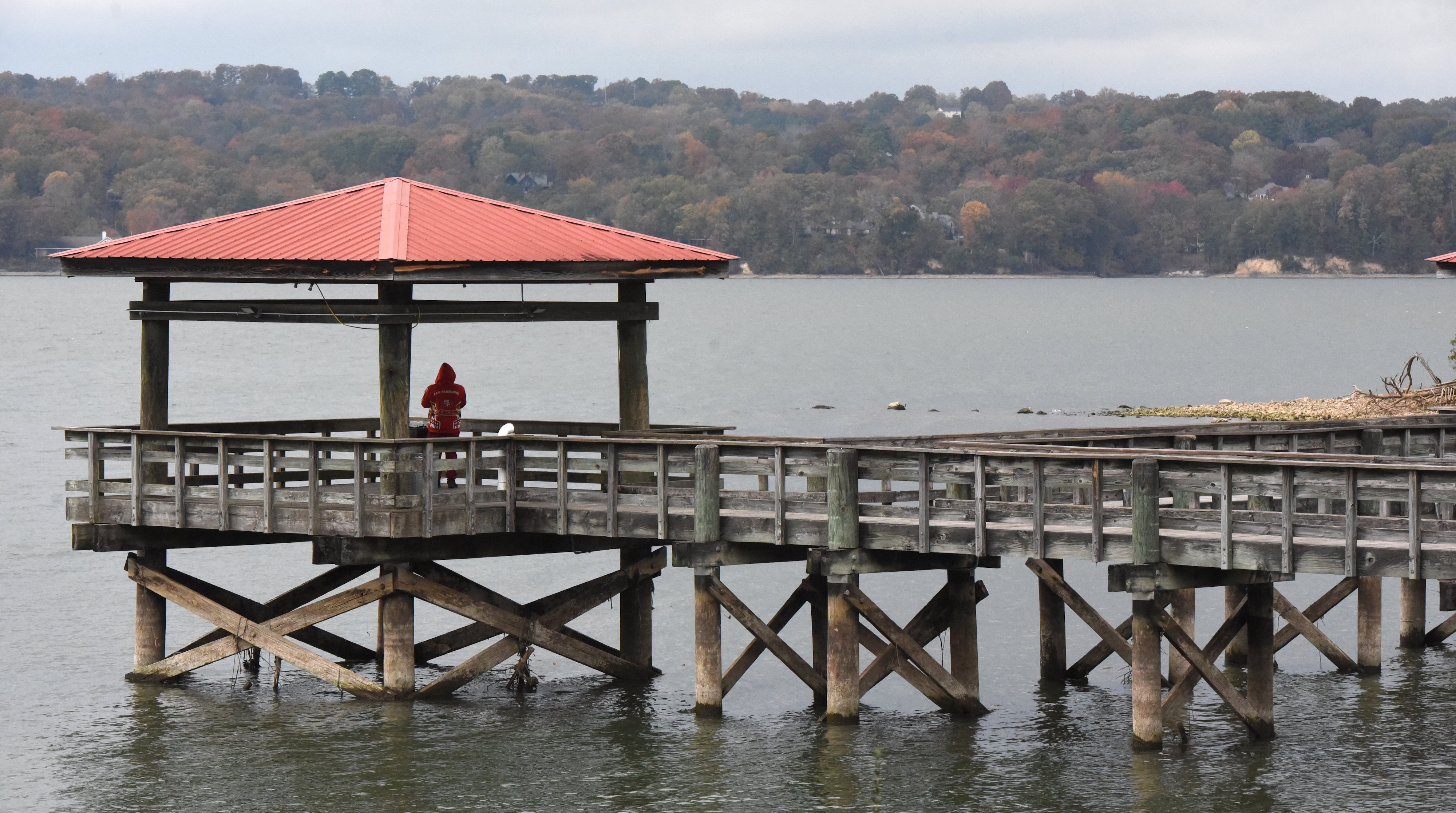 Staff file photo by Matt Hamilton / An angler wets a line from a pier at Booker T. Washington State Park. A public input meeting on proposals for the park is set for Jan. 13, 2026, in the park assembly hall.