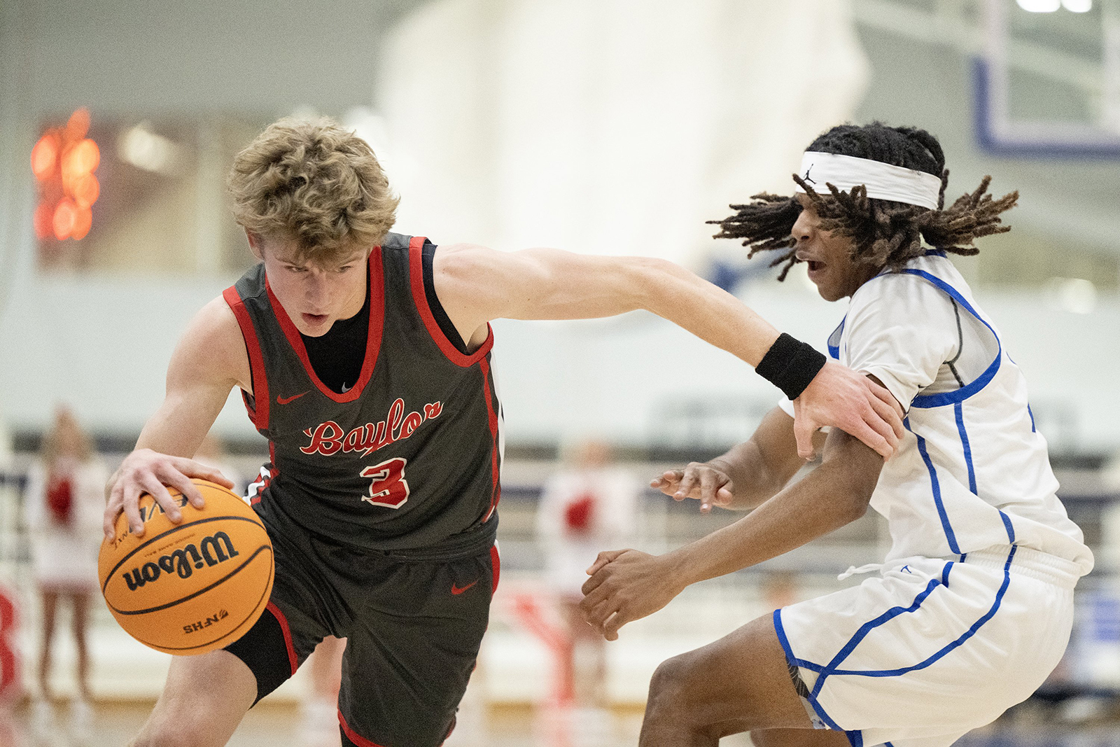 Staff Photo by Seth Carpenter/ Baylor's Jake Neal (3) rushes past McCallie's Yoda McGill (1). McCallie Boys' Basketball was hosting a match against Baylor on Friday, Jan. 16, 2026.