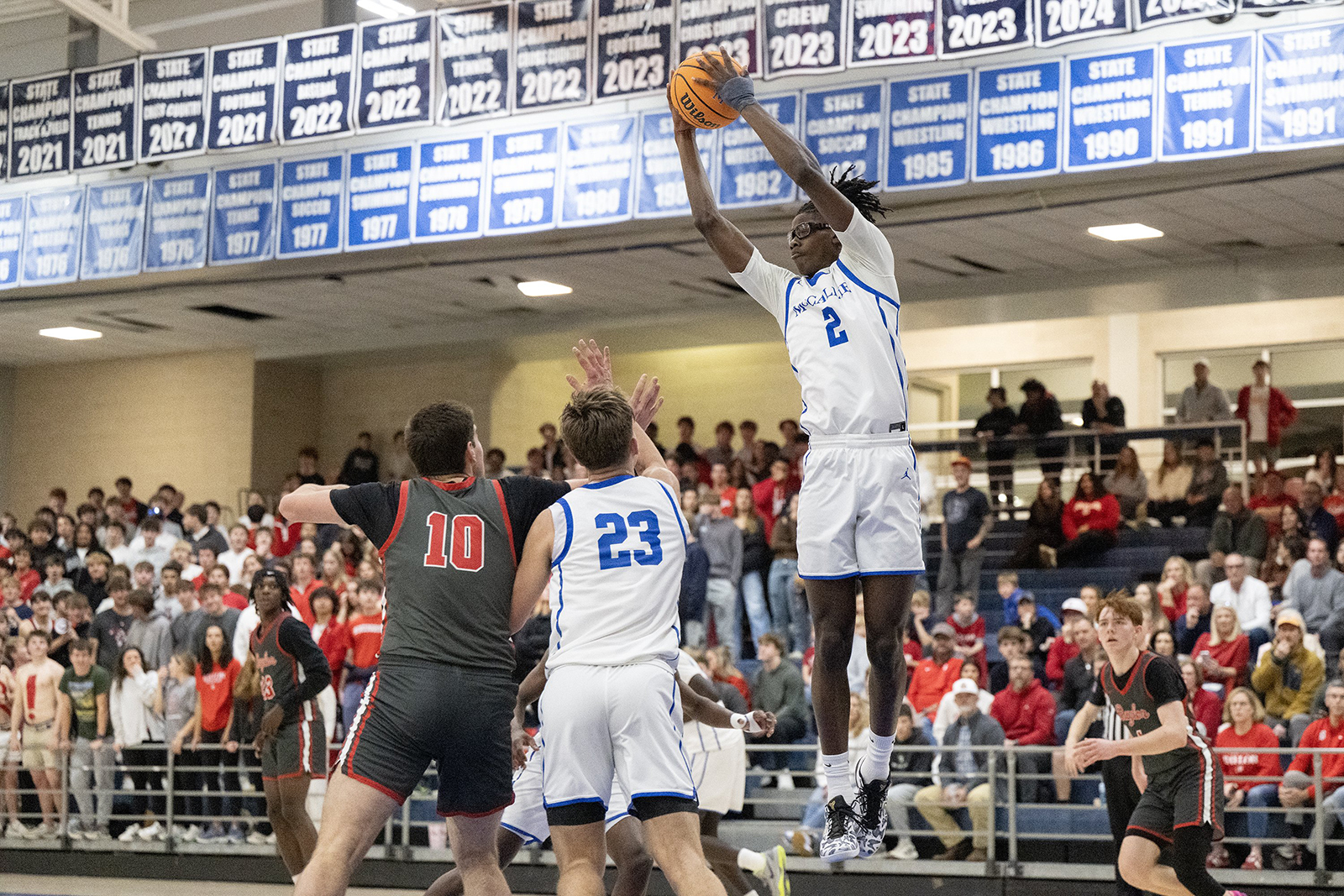 Staff Photo by Seth Carpenter/ McCallie's Ryan Wingard (2) catches the ball midair. McCallie Boys' Basketball was hosting a match against Baylor on Friday, Jan. 16, 2026.