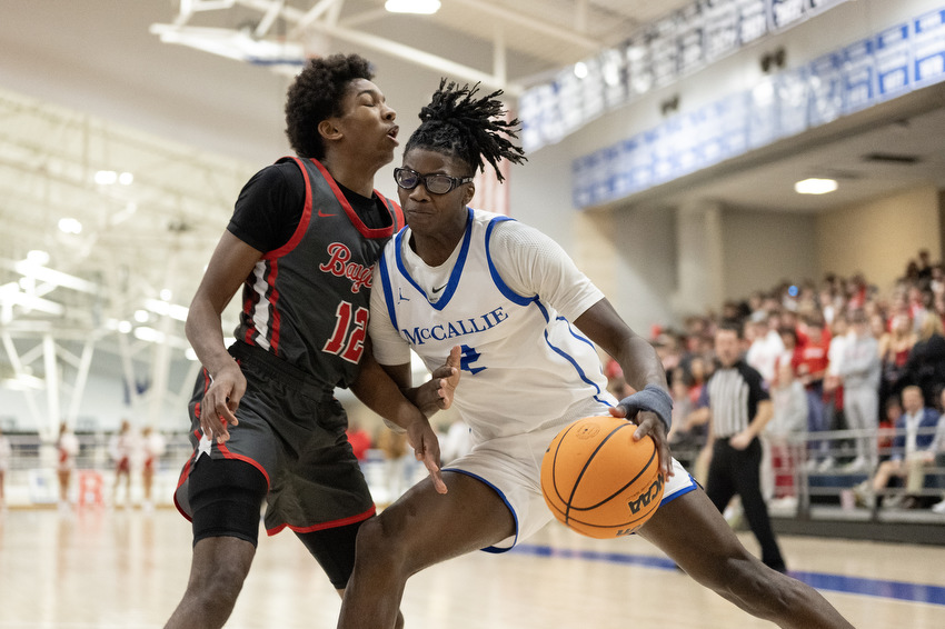 Staff Photo by Seth Carpenter/ McCallie's Ryan Wingard (2) knocks into Baylor's Ezra Sixto (12). McCallie Boys' Basketball was hosting a match against Baylor on Friday, Jan. 16, 2026.