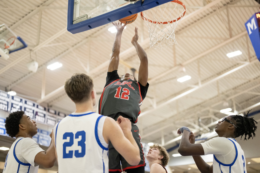 Staff Photo by Seth Carpenter/ Baylor's Ezra Sixto (12) goes for the basket. McCallie Boys' Basketball was hosting a match against Baylor on Friday, Jan. 16, 2026.