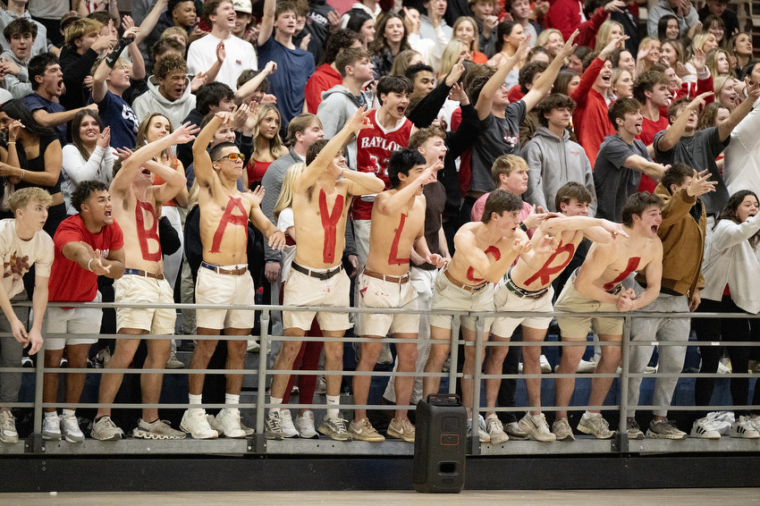 Staff Photo by Seth Carpenter/ Baylor's student section cheers raucously. McCallie Boys' Basketball was hosting a match against Baylor on Friday, Jan. 16, 2026.