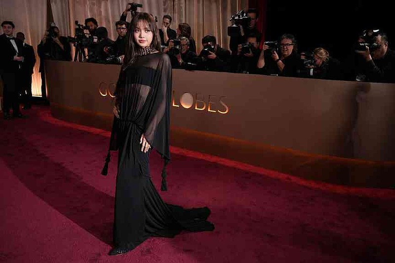 Lisa arrives at the 83rd Golden Globes on Sunday, Jan. 11, 2026, at the Beverly Hilton in Beverly Hills, Calif. (Photo by Jordan Strauss/Invision/AP)