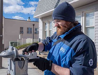 Parking operator: Coins to remain among parking payment options