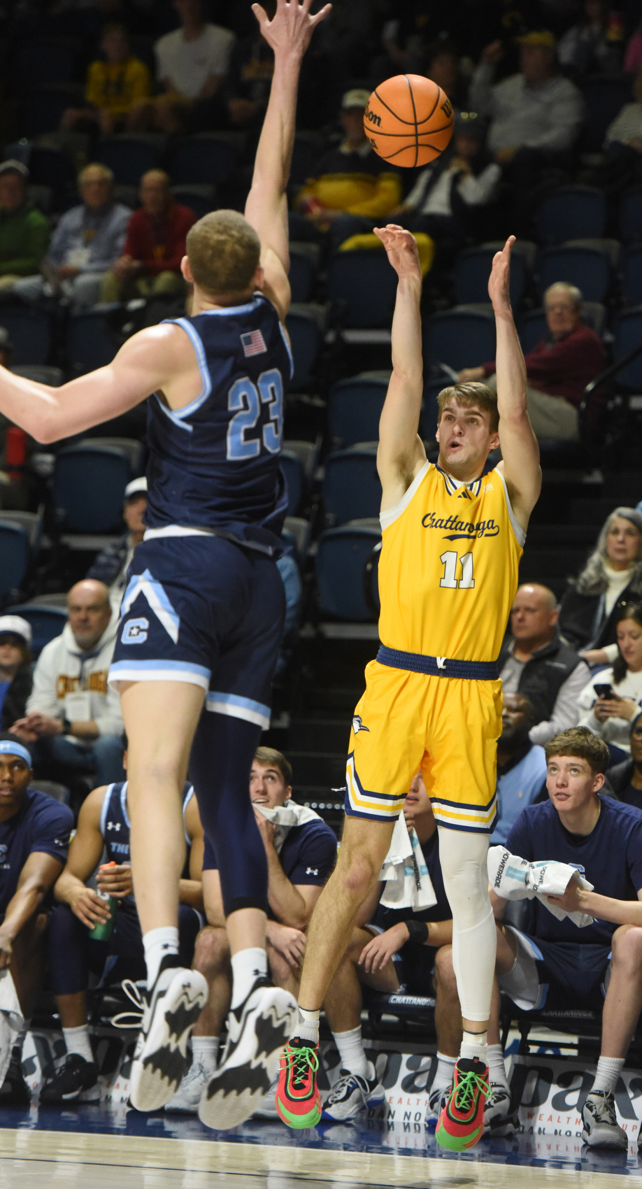 Staff photo by Matt Hamilton/ Citadel (23) Simeon German defends as UTC (11) Billy Smith puts up a three during their game at McKenzie Arena on Saturday, Feb. 7, 2026.