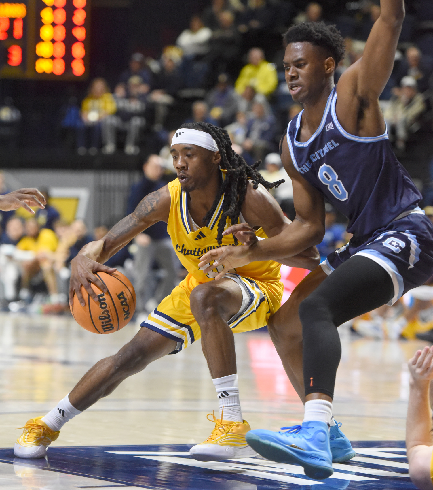 Staff photo by Matt Hamilton/ Citadel (8) Sola Adebisi defends as UTC (10) Teddy Washington dribbles the ball during their game at McKenzie Arena on Saturday, Feb. 7, 2026.