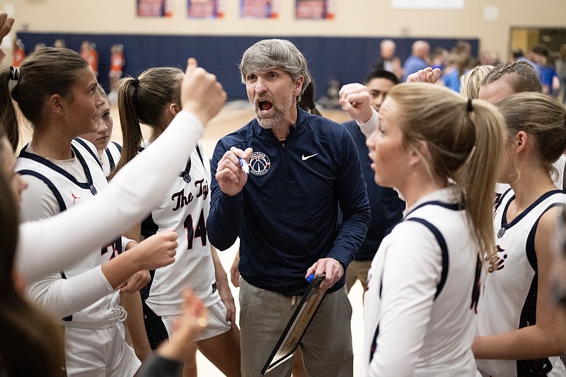 Staff File Photo by Seth Carpenter/ Heritage head coach Greg Elkins gives instructions during the team's win over Northwest Whitfield in the GHSA Class AAA playoffs Feb. 27 at Heritage. The Generals play for the state championship Wednesday in Macon.