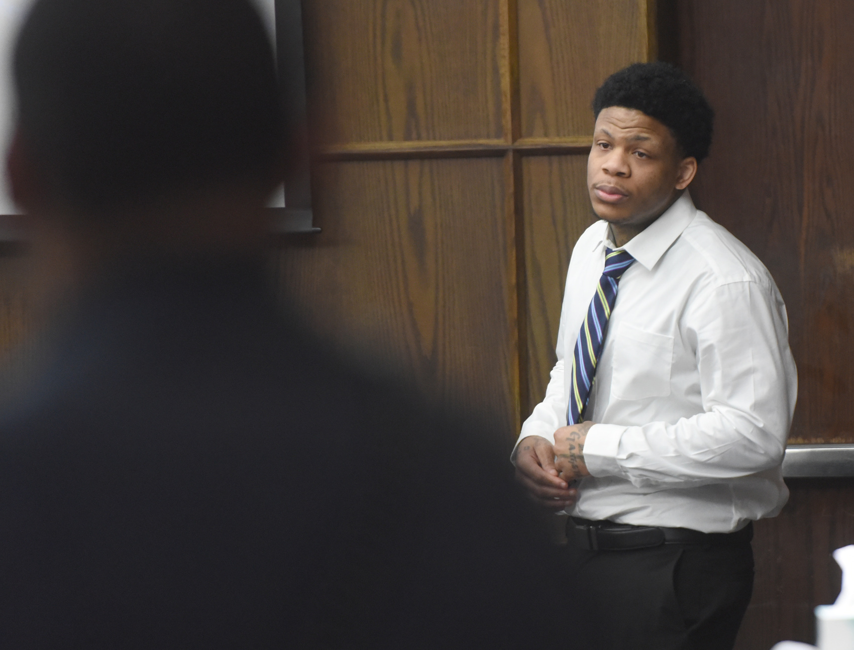 Staff photo by Matt Hamilton / Melvin Evans enters Judge Boyd Patterson's courtroom at the Courts Building.