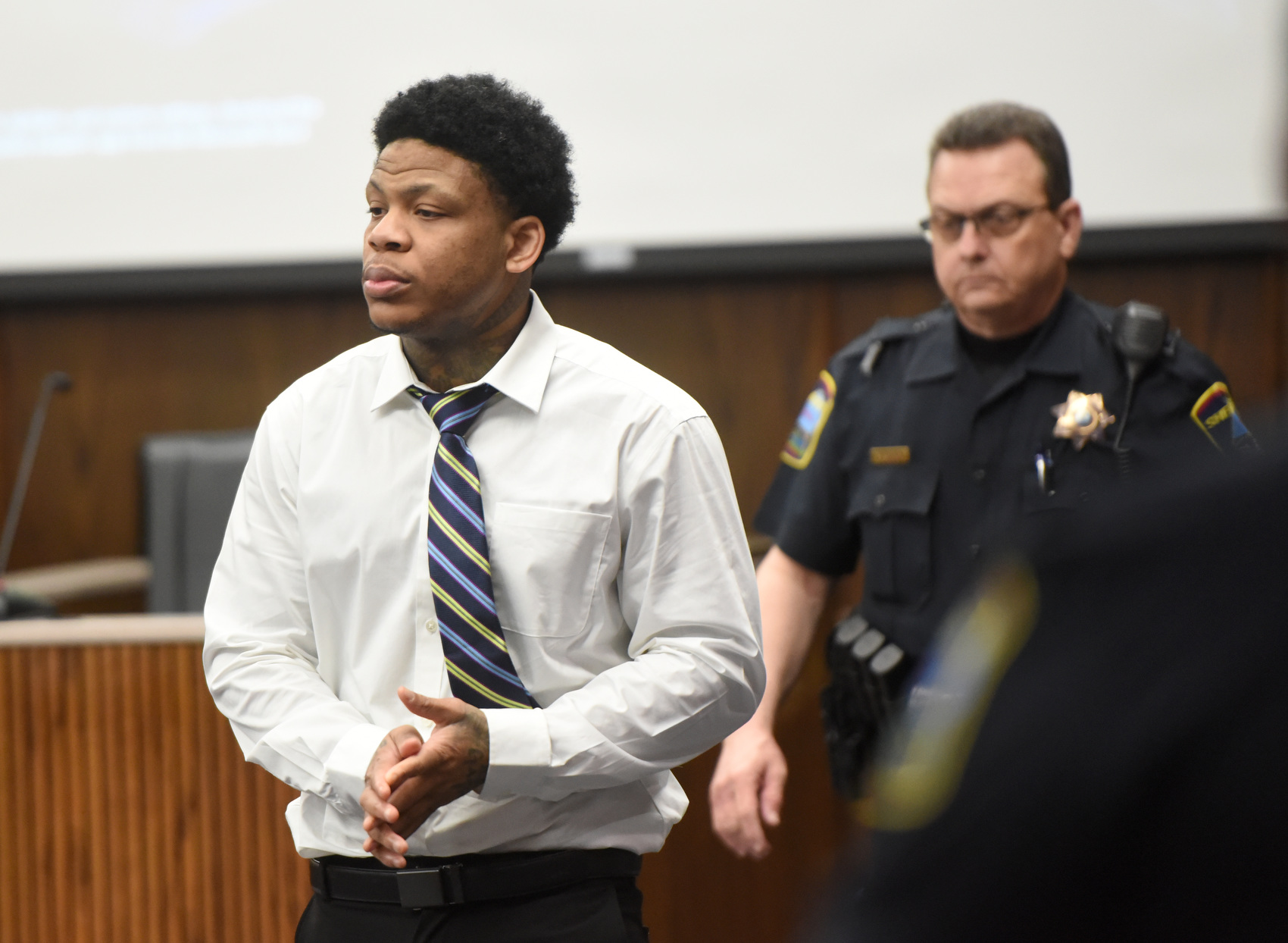 Staff photo by Matt Hamilton / Melvin Evans enters Judge Boyd Patterson's courtroom at the Courts Building.