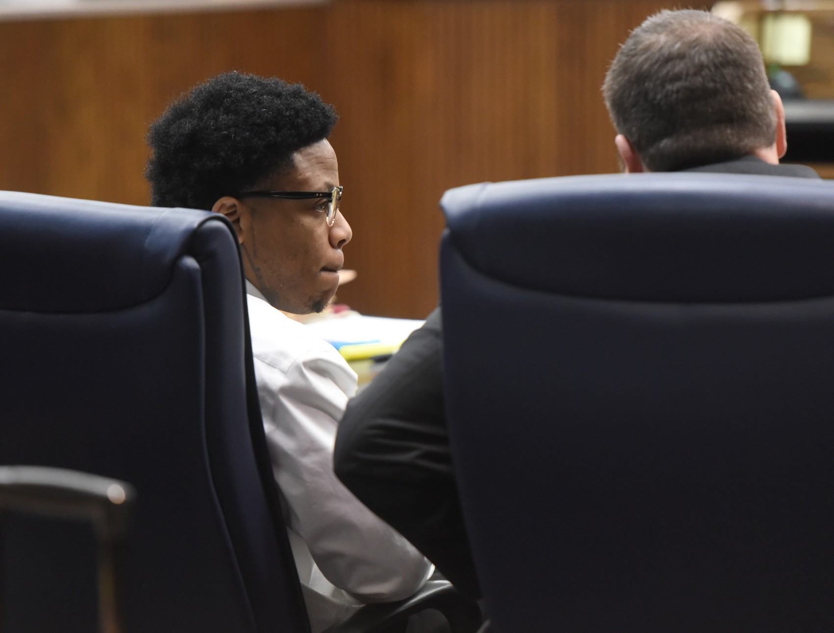 Staff photo by Matt Hamilton / Melvin Evans looks at potential jurors in Judge Boyd Patterson's courtroom at the Courts Building.
