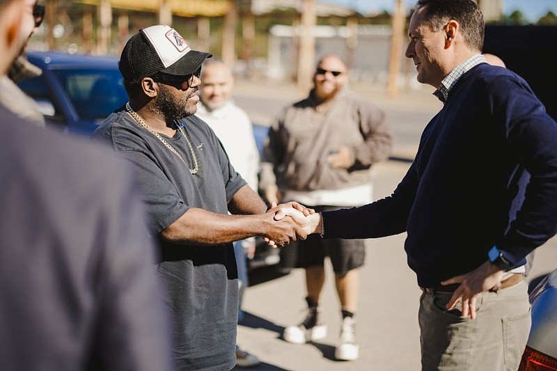 Contributed Photo / Urban Story Ventures CEO Jimmy White, right, and Rodney Jerkins, Grammy-winning music producer, meet at The Bend. Jerkins has expressed support for White's endeavor to create a music and movie studio in the old Hamilton County downtown jail building.