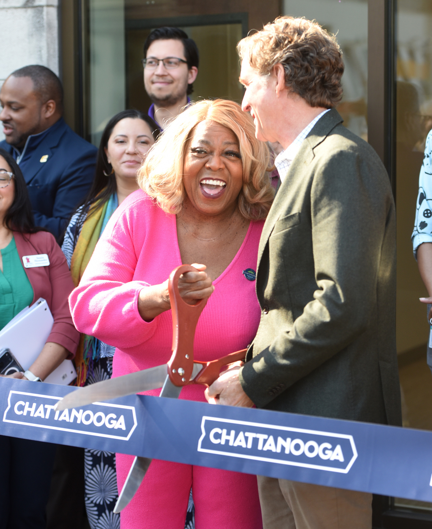Staff photo by Matt Hamilton / Councilwoman Marvene Noel and Chattanooga Mayor Tim Kelly prepare to cut the ribbon during the ribbon cutting ceremony for the Chattanooga Small Business Resource Center on Friday, March 20, 2026.