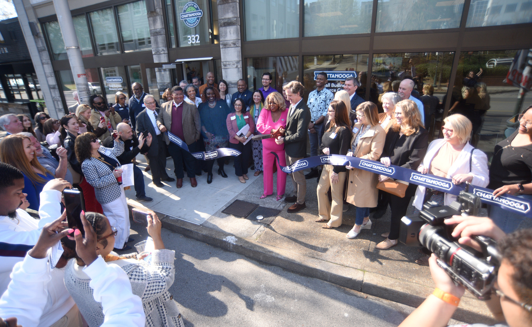 Staff photo by Matt Hamilton / Councilwoman Marvene Noel and Chattanooga Mayor Tim Kelly cut the ribbon during the ribbon cutting ceremony for the Chattanooga Small Business Resource Center on Friday, March 20, 2026.