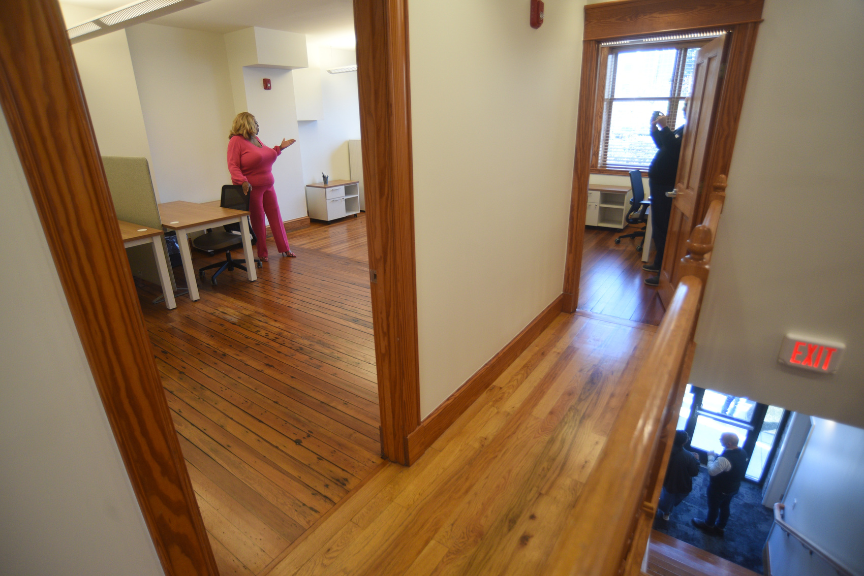 Staff photo by Matt Hamilton / Visitors tour various rooms after the ribbon cutting ceremony for the Chattanooga Small Business Resource Center on Friday, March 20, 2026.