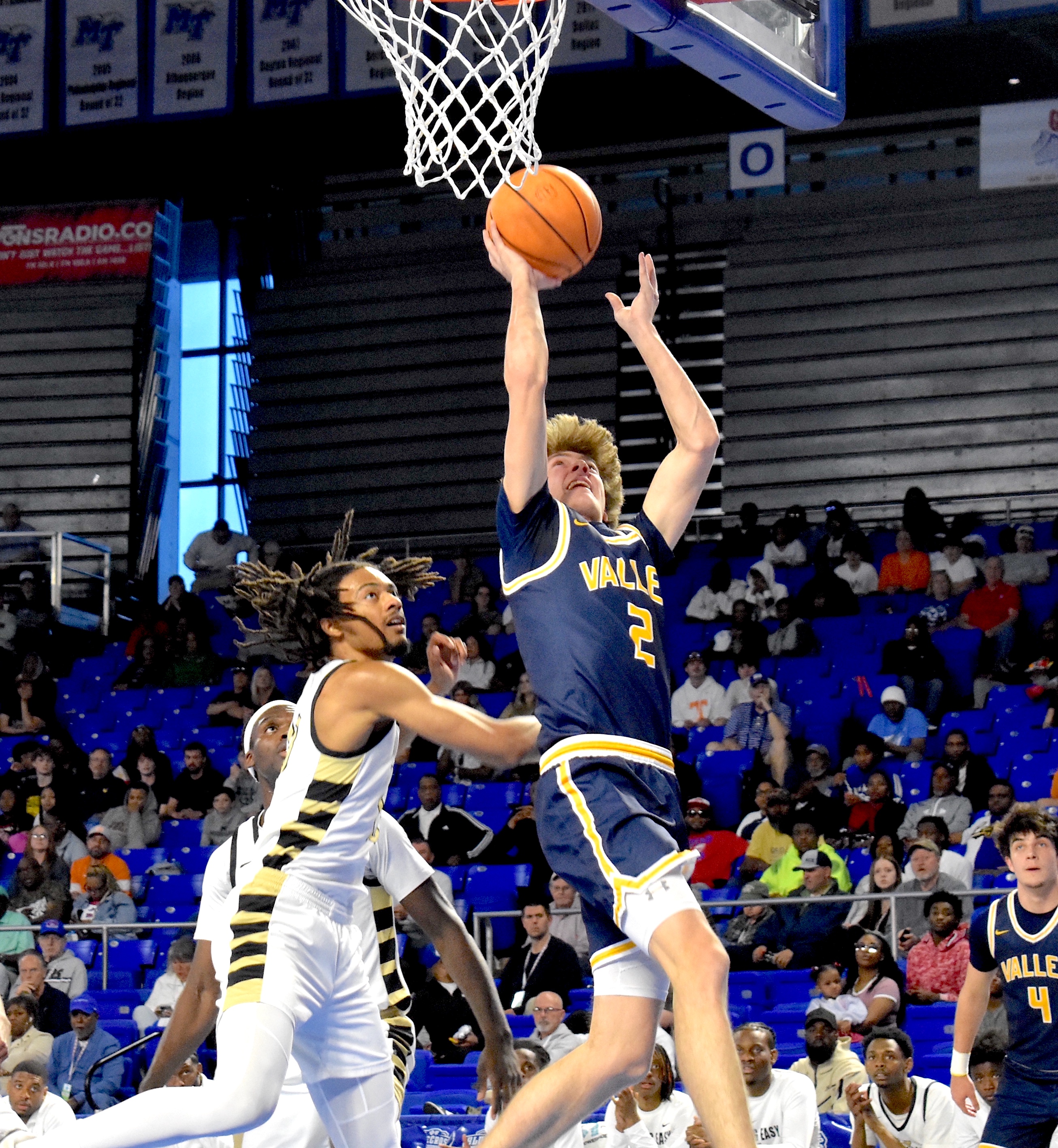 Staff photo by Patrick MacCoon / Walker Valley senior Turner Clayton makes a layup against Whitehaven during a TSSAA Class 4A state semifinal Friday at Middle Tennessee State University's Murphy Center.