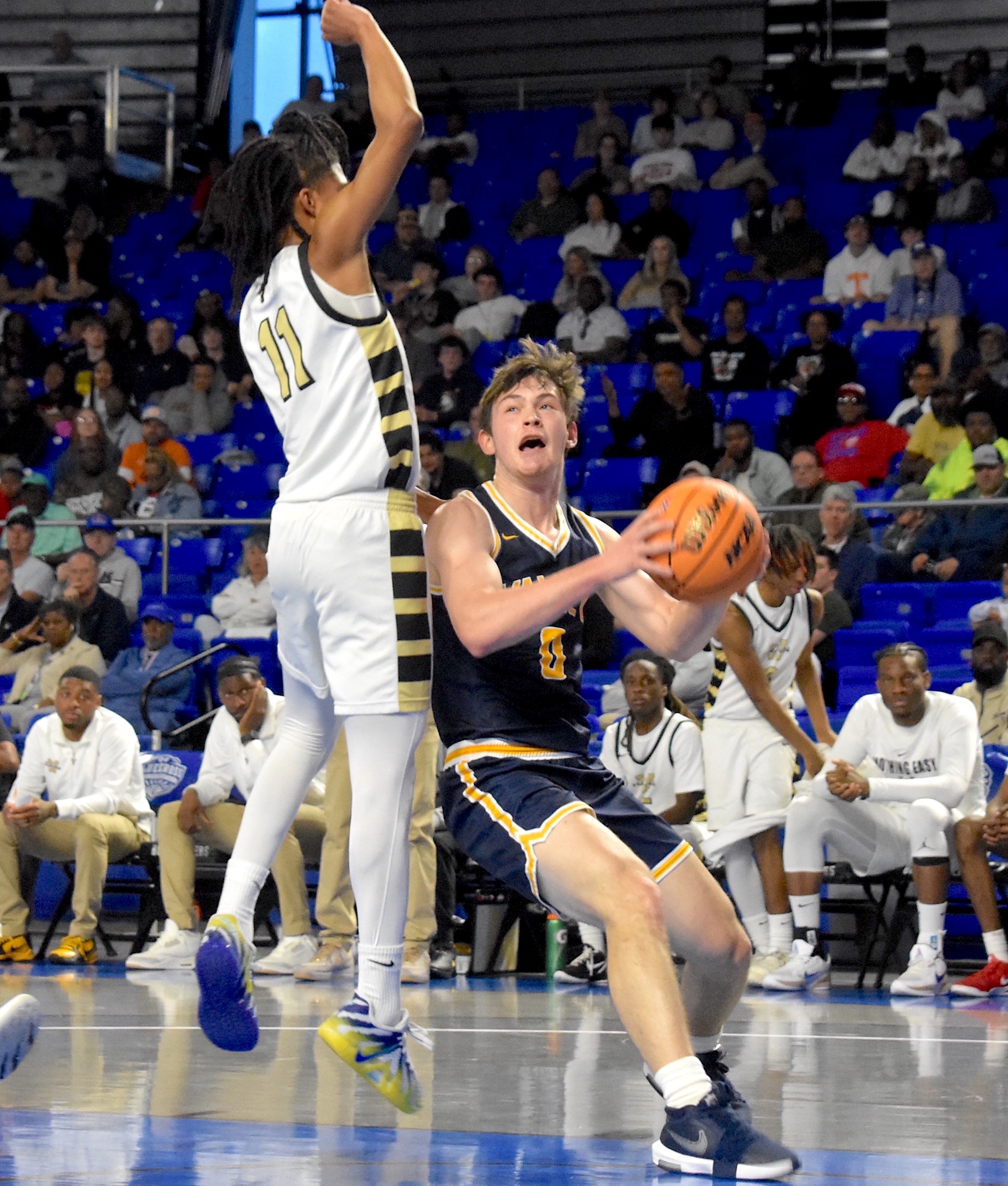 Staff photo by Patrick MacCoon / Walker Valley senior Isaac Sausville sets to go up and draw a foul against Whitehaven during a TSSAA Class 4A state semifinal Friday at Middle Tennessee State University's Murphy Center.