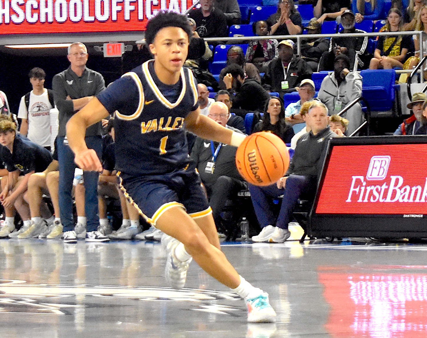 Staff photo by Patrick MacCoon / Walker Valley senior point guard Ashton Davis brings the ball upcourt against Whitehaven during a TSSAA Class 4A state semifinal Friday at Middle Tennessee State University's Murphy Center.