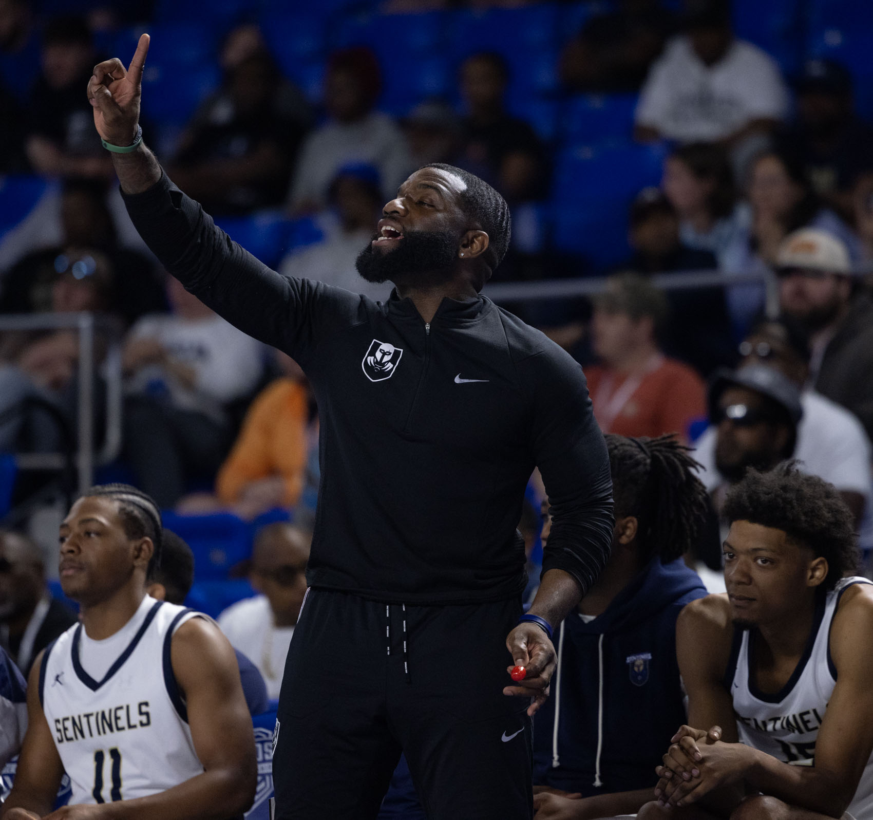 Staff photo by Larry Sullivan II/Chatt. Prep boys basketball Head Coach Christian Collins calls out a play during the Class 2A basketball state championship game on Saturday, March 21, 2026.