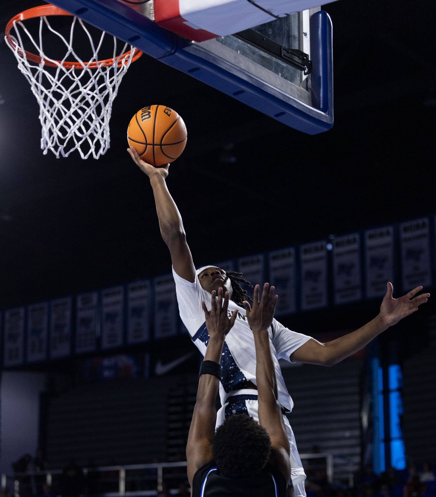 Staff photo by Larry Sullivan II/Chatt. Prep's Kentrell Watkins (with ball) does a layup while guarded by Westview's Ethan Pettigrew during the Class 2A basketball state championship game on Saturday, March 21, 2026.