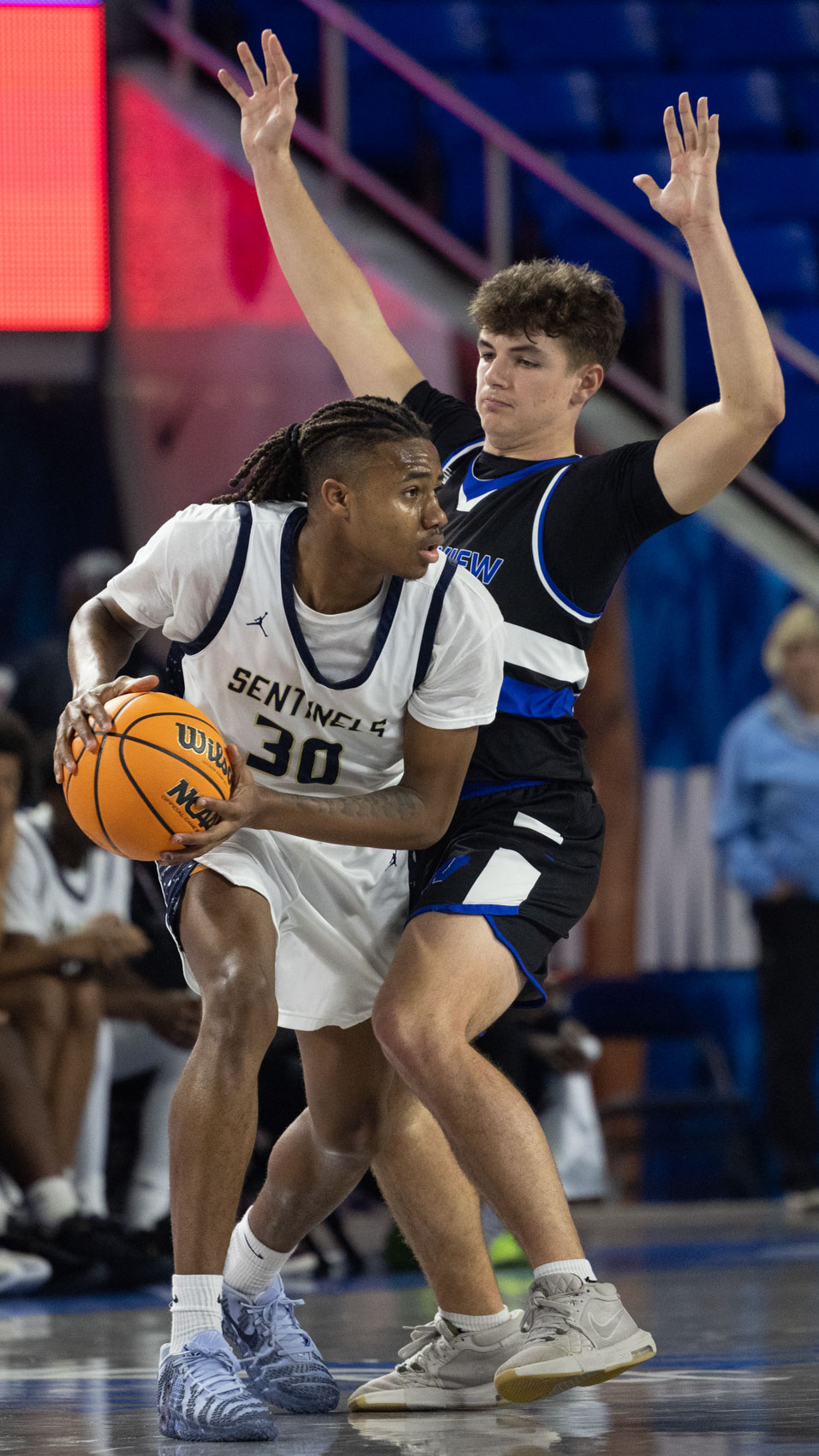 Staff photo by Larry Sullivan II/Chatt. Prep's Derrick Roberson (#30) defends the basketball from Westview's Graham Simpson during the Class 2A basketball state championship game on Saturday, March 21, 2026.