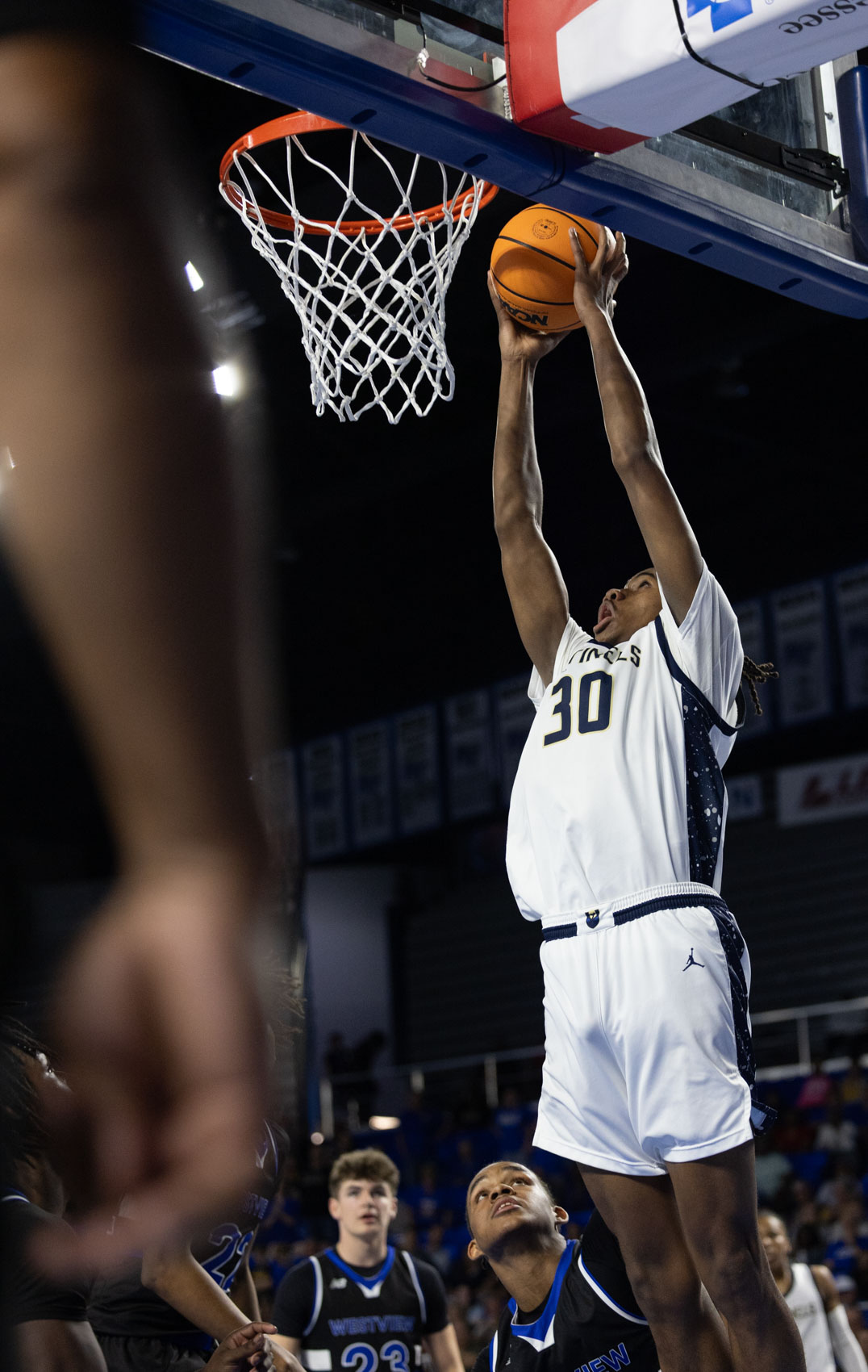 Staff photo by Larry Sullivan II/Chatt. Prep's Derrick Roberson (#30) reaches to dunk the basketball during the Class 2A basketball state championship game on Saturday, March 21, 2026.