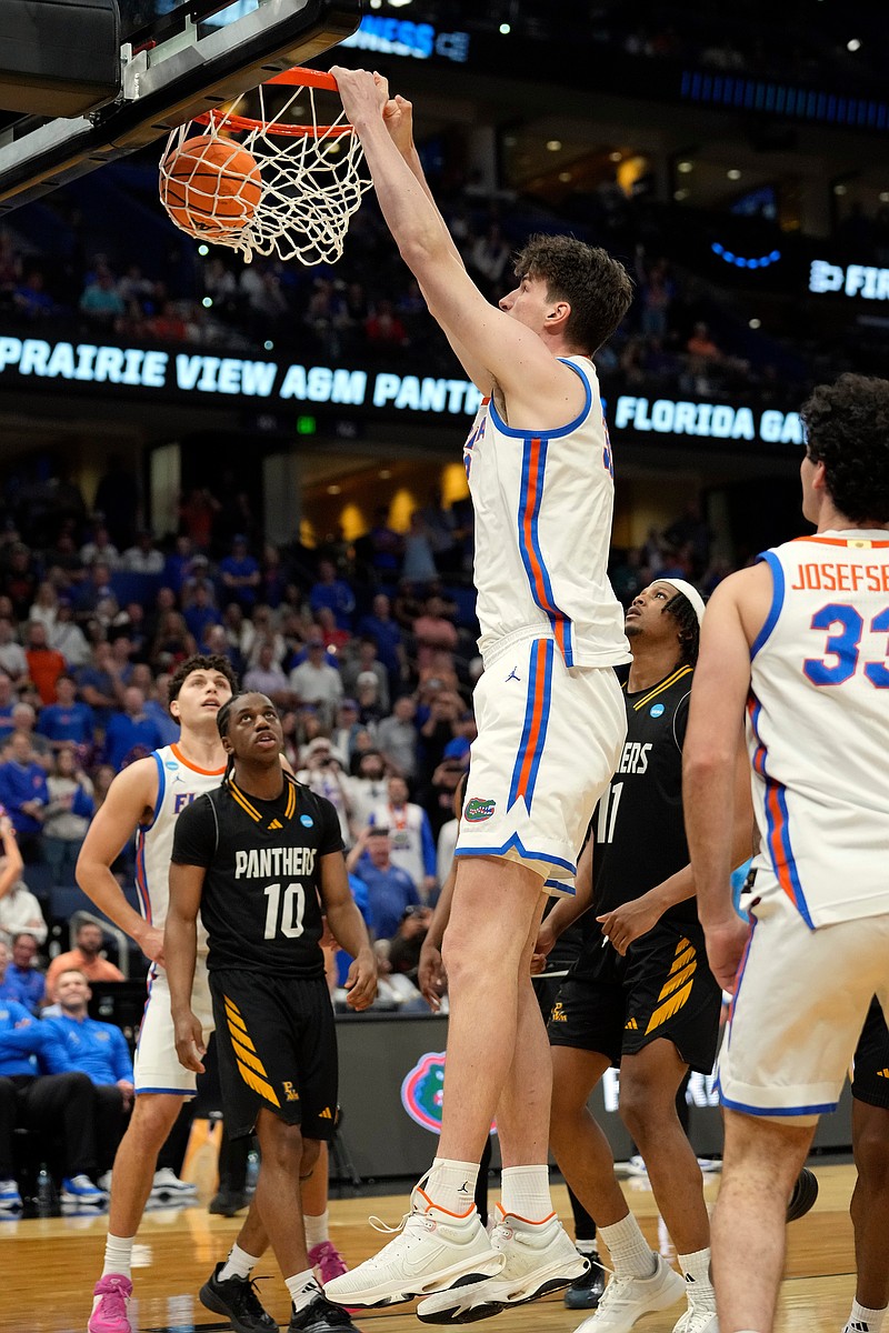 March Madness spotlight shines on Florida's 7-foot-9 center