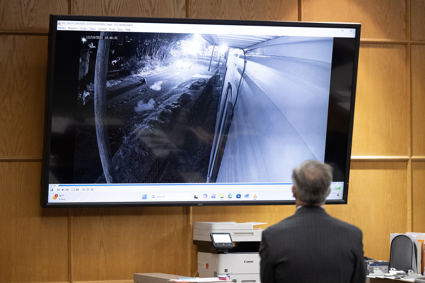 Staff Photo by Seth Carpenter / Footage that allegedly shows the shooting death of Wallace Milam plays in Hamilton County Judge Tori Smith's courtroom. Terrance Brewer Jr. and Milik Woodley were in a preliminary hearing in connection with their alleged role in the shooting death of Milam.