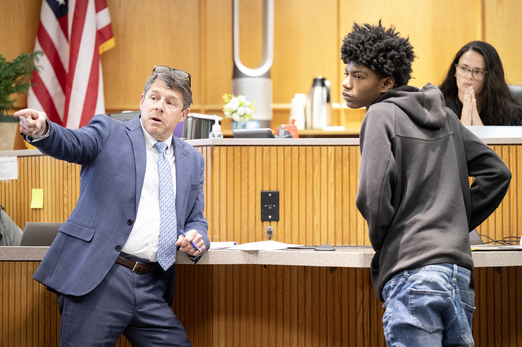 Staff Photo by Seth Carpenter / Attorney Jason Thomas cross-examines Jaden Rue in Hamilton County Judge Tori Smith's courtroom. Terrance Brewer Jr., Thomas' client, and Milik Woodley were in a preliminary hearing in connection with their alleged role in the shooting death of Wallace Milam.