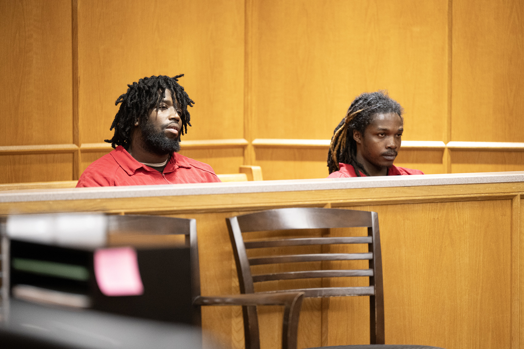 Staff Photo by Seth Carpenter / Terrance Brewer Jr. (left) and Milik Woodley sit in Hamilton County Judge Tori Smith's courtroom. Brewer and Woodley were in a preliminary hearing in connection with their alleged role in the shooting death of Wallace Milam.
