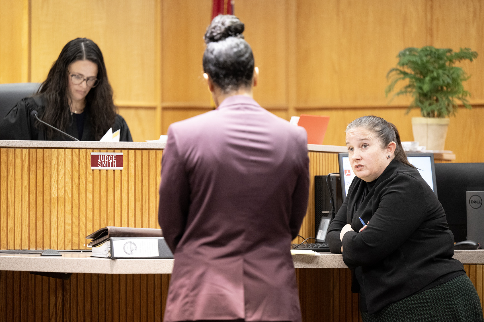 Staff Photo by Seth Carpenter / Assistant District Attorney Vicki Carriker questions Detective Marina Wilkerson in Hamilton County Judge Tori Smith's courtroom. Terrance Brewer Jr. and Milik Woodley were in a preliminary hearing for their alleged role in the shooting death of Wallace Milam.