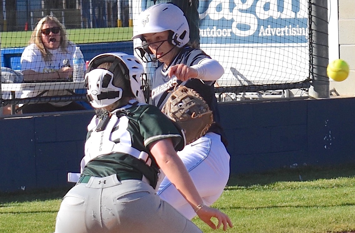 Staff photo by Patrick MacCoon / Chattanooga Christian sophomore Millie Fox slides in to home safely for an inside-the-park home run during Monday's home game against Silverdale Baptist.