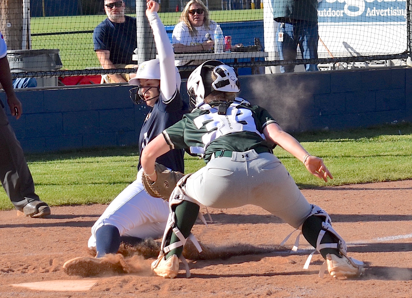 Staff photo by Patrick MacCoon / Chattanooga Christian sophomore Millie Fox slides in to home safely for an inside-the-park home run during Monday's home game against Silverdale Baptist.