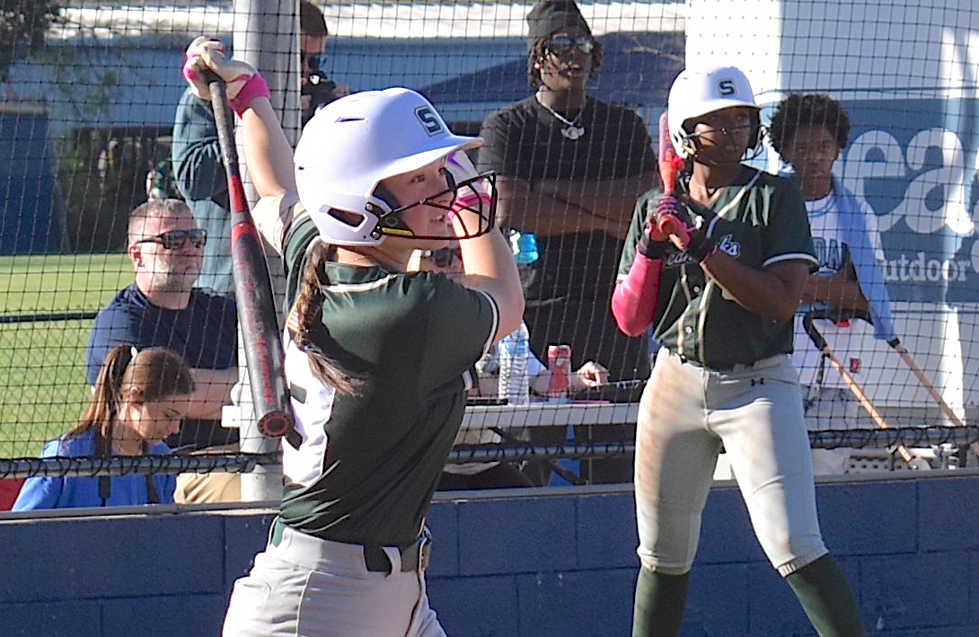 Staff photo by Patrick MacCoon / Silverdale Baptist junior Bita Cox watches her two-run triple fly to the right field corner during Monday's non-region game against Chattanooga Christian. Cox had two extra-base hits in an 11-run fifth inning for the Lady Seahawks in a 12-2 victory.