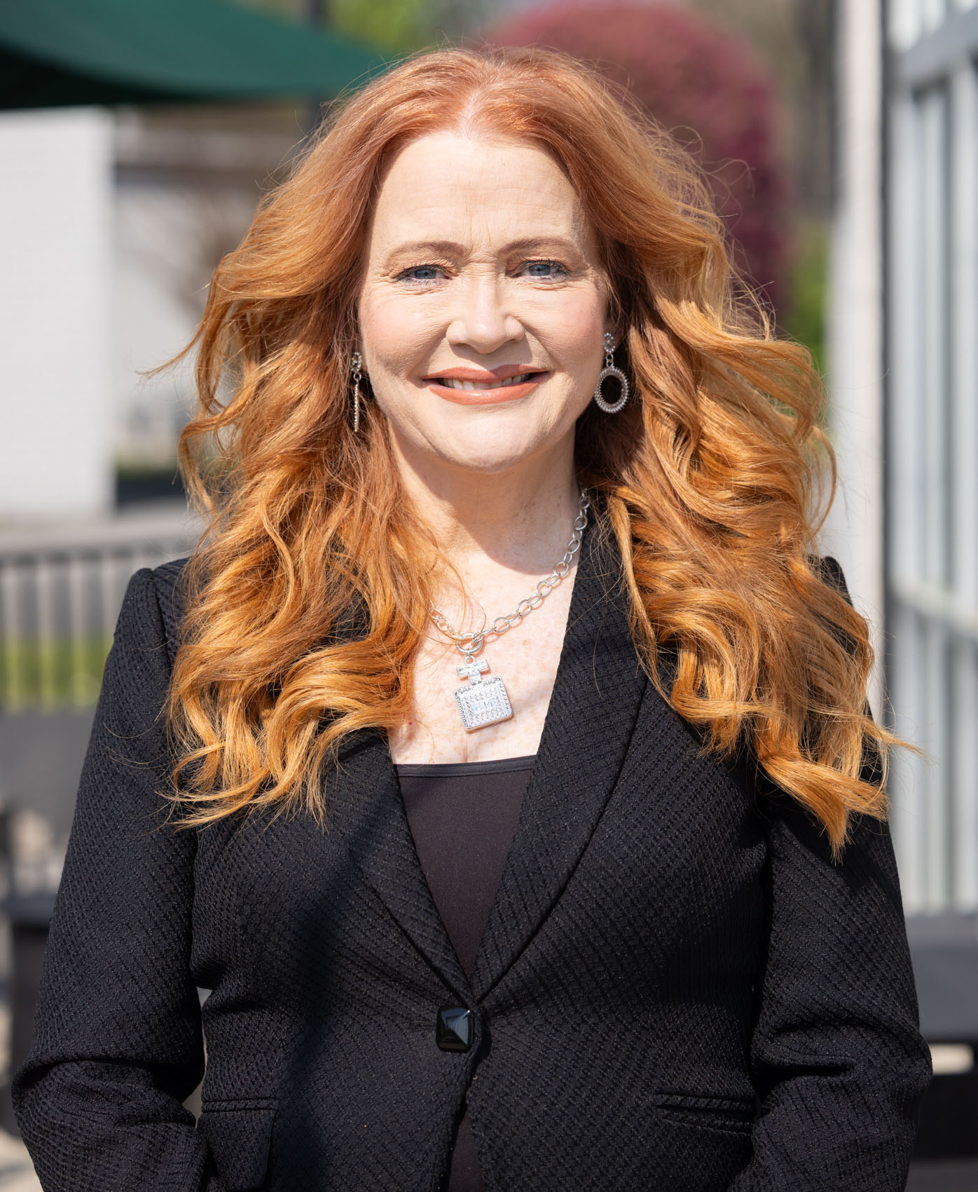 Staff photo by Larry Sullivan II /Donna Christian-Lowe smiles for a portrait. Christian-Lowe is challenging incumbent Hamilton County Commissioner Steve Highlander in the Republican primary May 5.