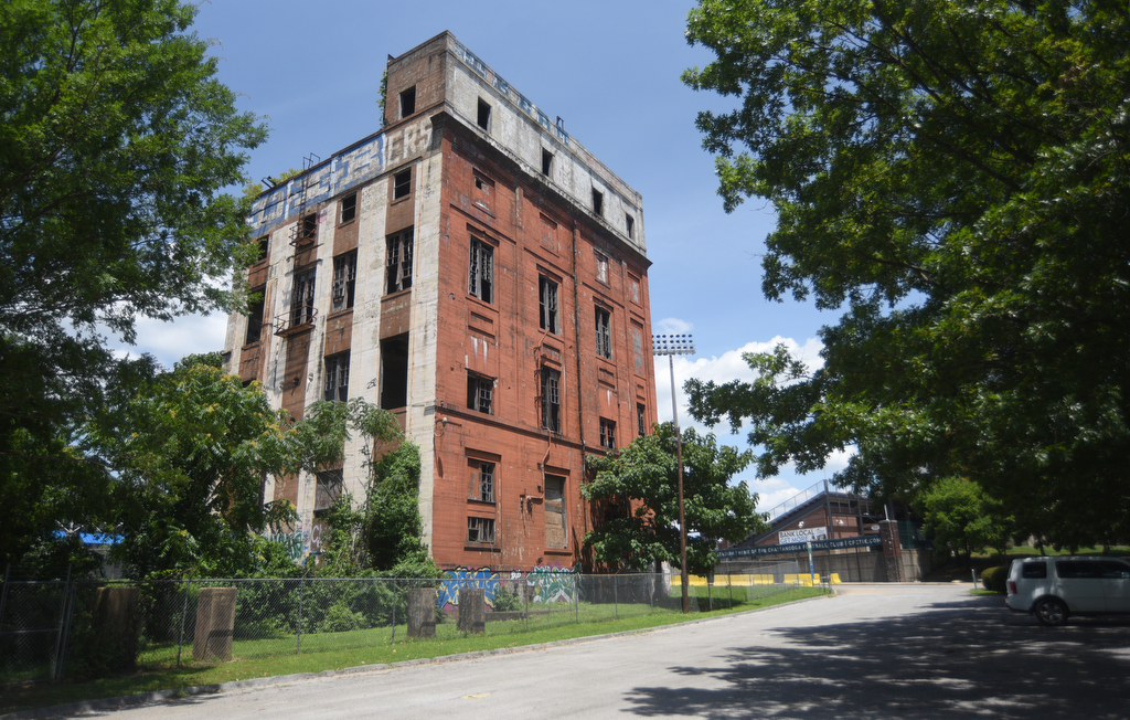 Staff file photo by Matt Hamilton / The vacant Parkway Towers building across from Finley Stadium is pictured.
