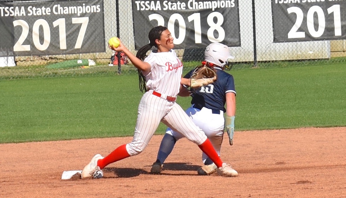 Staff photo by Patrick MacCoon / Baylor junior shortstop Amiya Leach attempts a double-play turn in Thursday's home district contest against Chattanooga Christian.