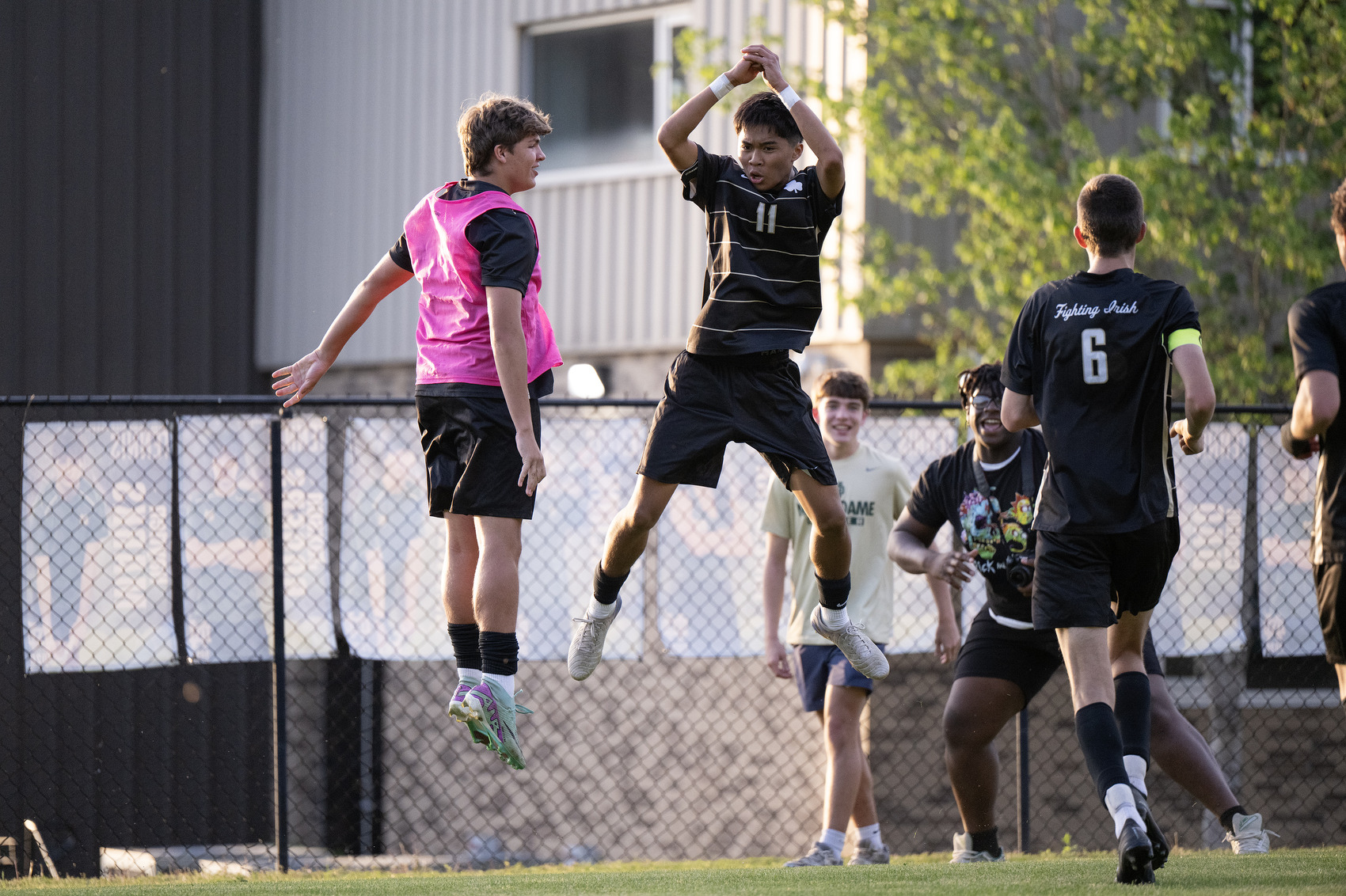 Staff Photo by Seth Carpenter/ Notre Dame's Caleb Salenda (11) celebrates a goal with his teammate Thomas Wagnon (18) at Notre Dame High School on Friday, April 10, 2026.