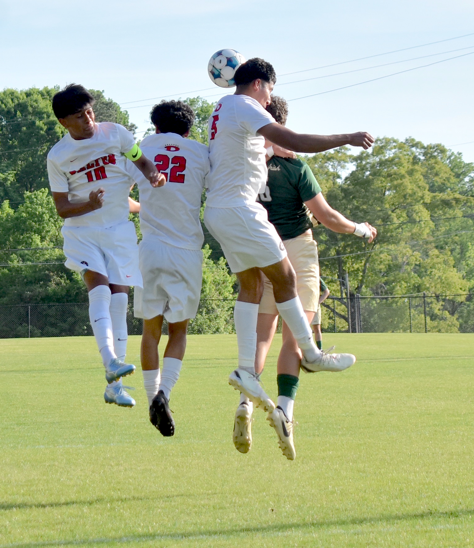 Staff photo by Patrick MacCoon / Dalton's defense heads a ball away from their box in Tuesday's 1-1 draw against host Notre Dame at Jim Eberle Field.