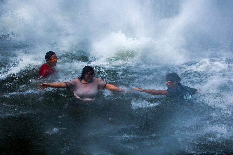 Staff file photo / Three people swim at Fall Creek Falls. While the popular Blue Hole at North Chickamauga Creek Gorge State Park is closed for about a year, there are still plenty of Chattanooga area spots to swim at this summer.