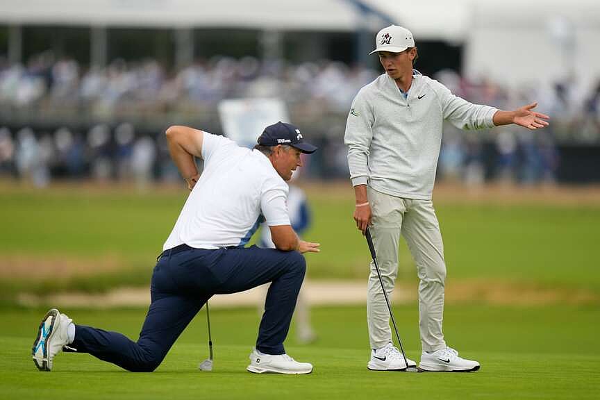 Well done, young man: 17-year-old Russell’s US Open debut impresses 54-year-old partner Harrington