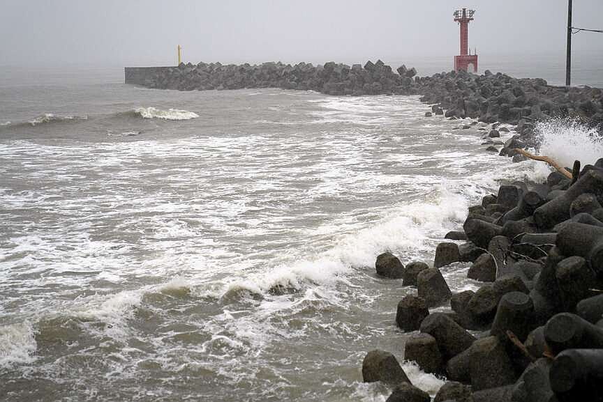Two tropical storms pound Japan with floods and landslides, killing 1