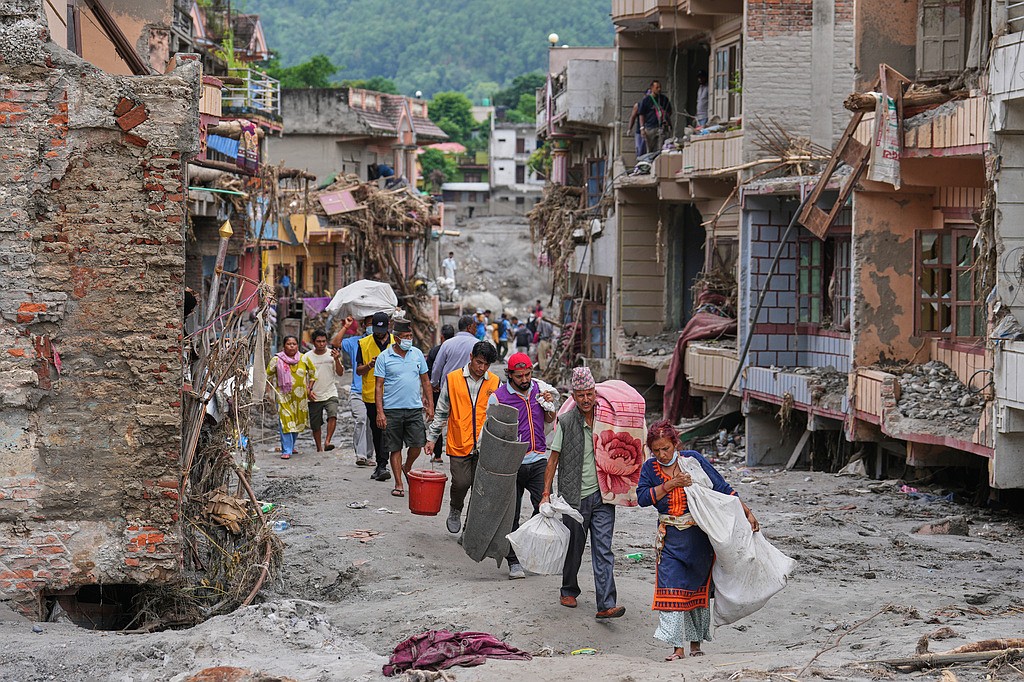 Nepal-China flood survivors reach safe areas as families await news of nearly 3,000 missing
