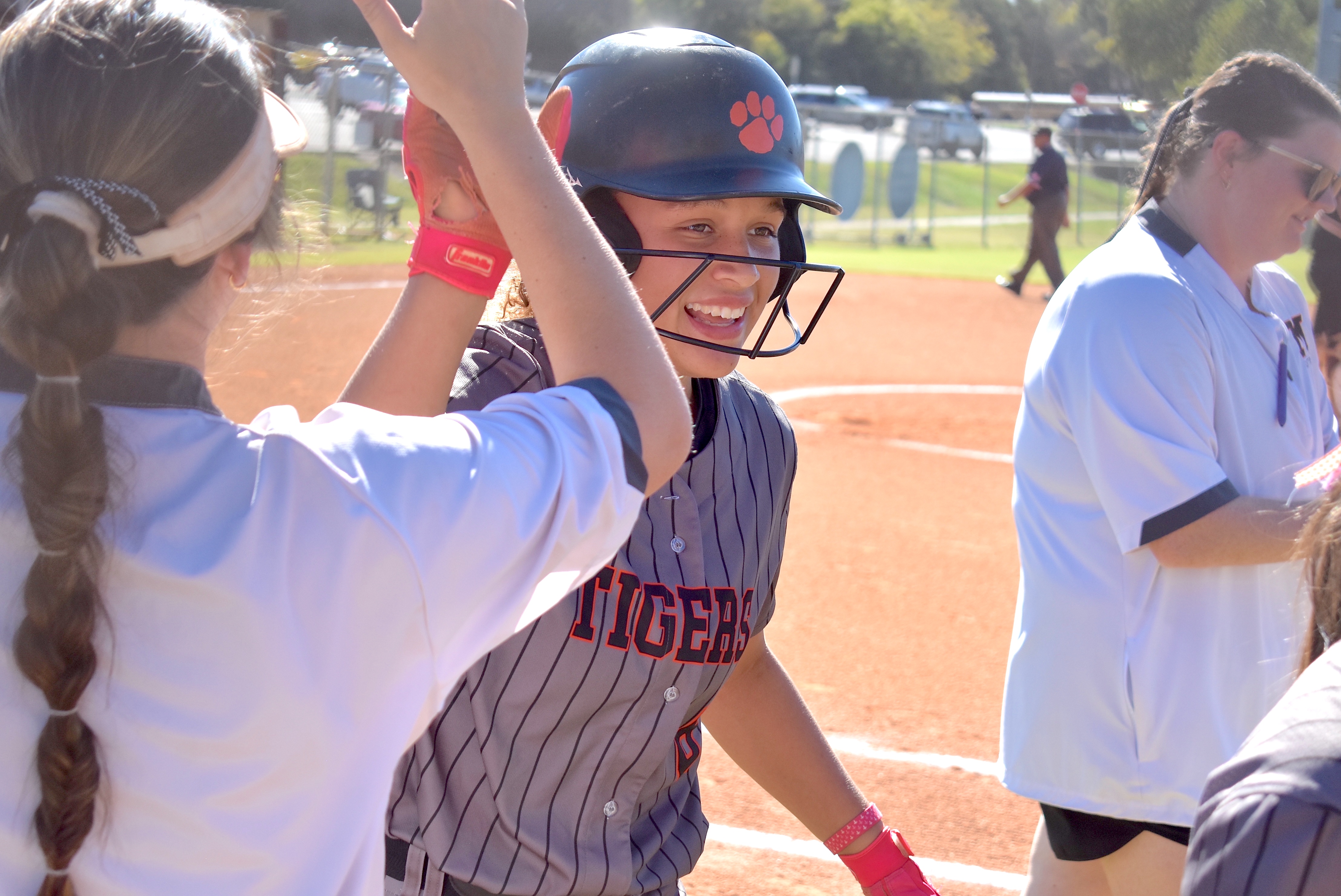 Staff photo by Patrick MacCoon / Metter's Zailee Thurman smiles after hitting a home run during Tuesday's road victory over Dade County in a decisive Game 3 in the second round of the GHSA Class AA state playoffs.