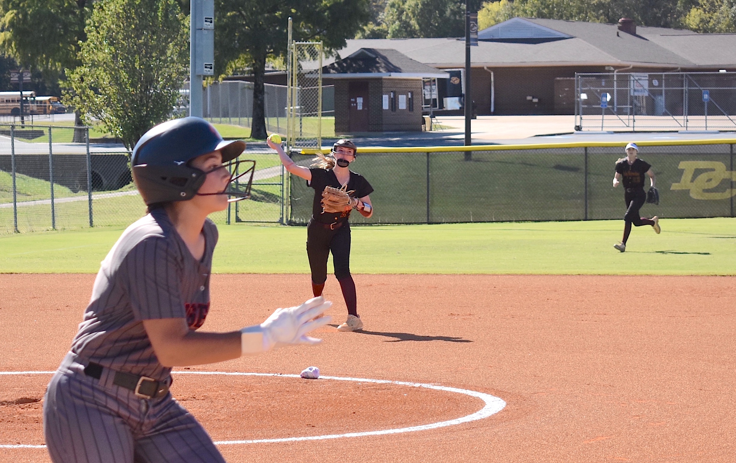 Staff photo by Patrick MacCoon / Dade County freshman shortstop Norah Massey makes a put out during Tuesday's home game against Metter in the second round of the GHSA Class AA state playoffs.
