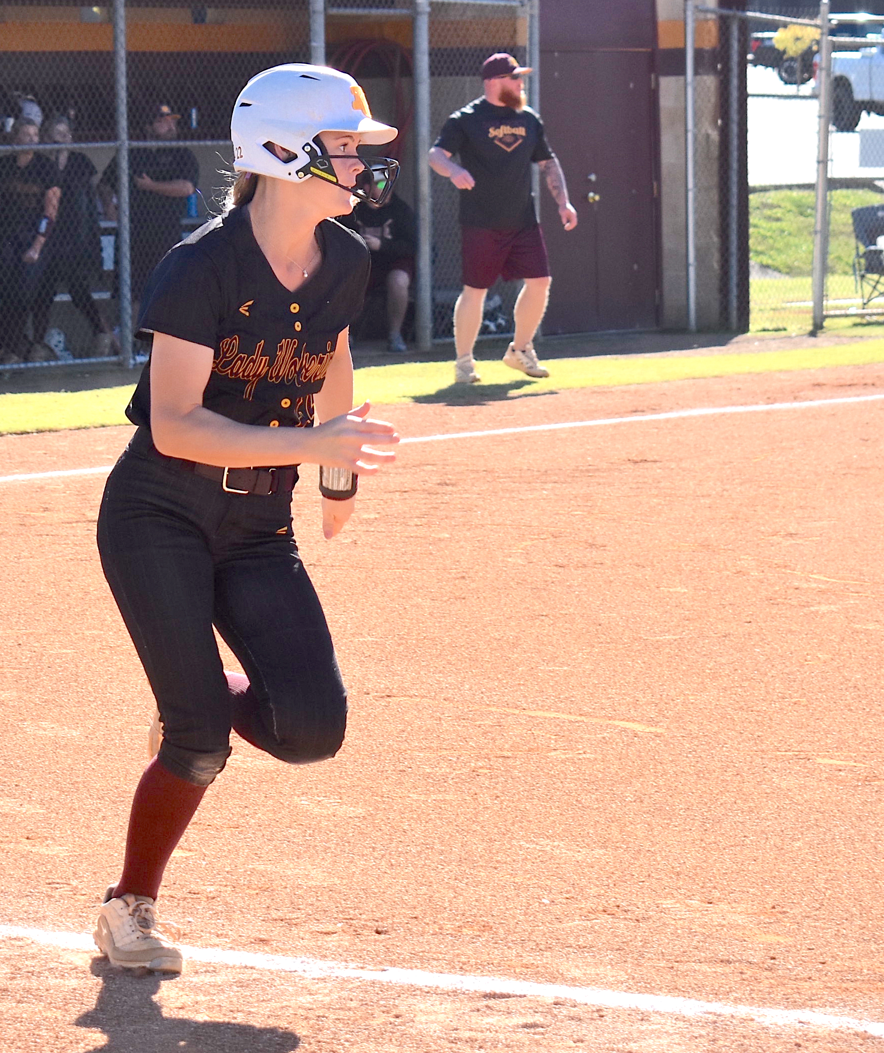 Staff photo by Patrick MacCoon / Dade County's Winter Daniel watches her RBI triple during Tuesday's home game against Metter in the second round of the GHSA Class AA state playoffs.