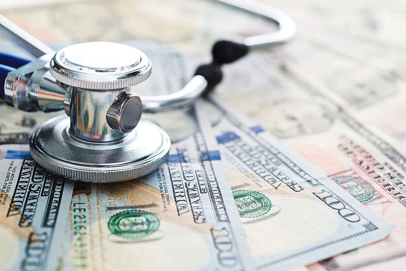 Medicine and money / Getty Images