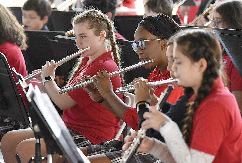 Staff Photo by Matt Hamilton / Members of the Collegedale Academy band perform patriotic music on Thursday, November 11, 2021 during the Veterans Day Ceremony in the Collegedale Commons. The event was moved from the Collegedale Veterans Park to the Commons due to the threat of inclement weather.