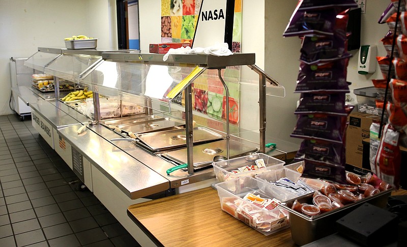 Staff file photo / At Barger Academy, circa 2019, the lunch line forms in a small room between the school’s lobby and the cafeteria.