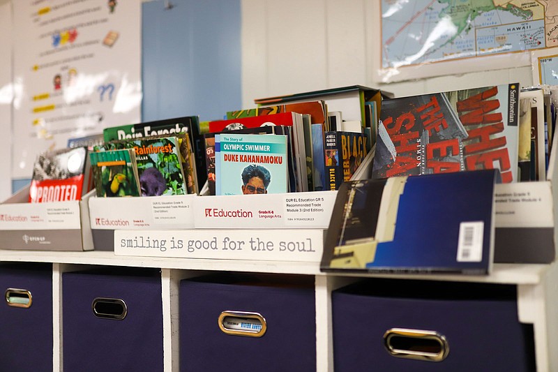 Staff photo by Olivia Ross  / Books sit on a shelf in James Cunningham and Dee Dee Womack's classroom on August 30, 2022 at Clifton Hills Elementary School.