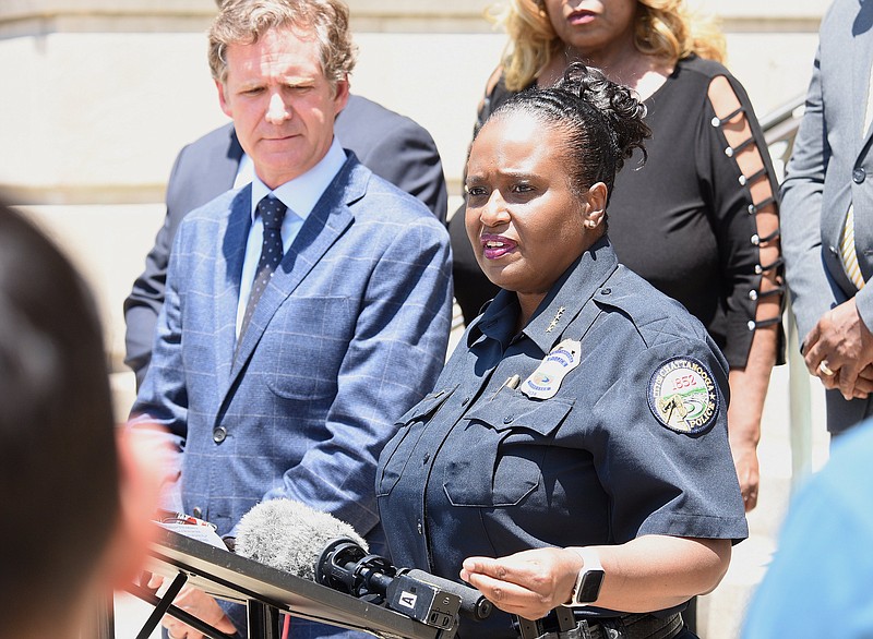 Staff photo by Matt Hamilton / Mayor Tim Kelly looks on as police chief Celeste Murphy speaks to members of the media during a press conference on the steps of Chattanooga City Hall on Sunday, June 5, 2022.